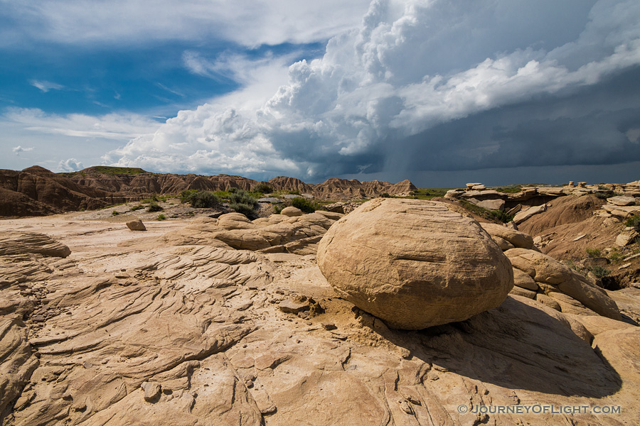 A storm rages above the landscape just beyond Toadstool Geologic Park in northwestern Nebraska. - Toadstool Geologic Park Photography