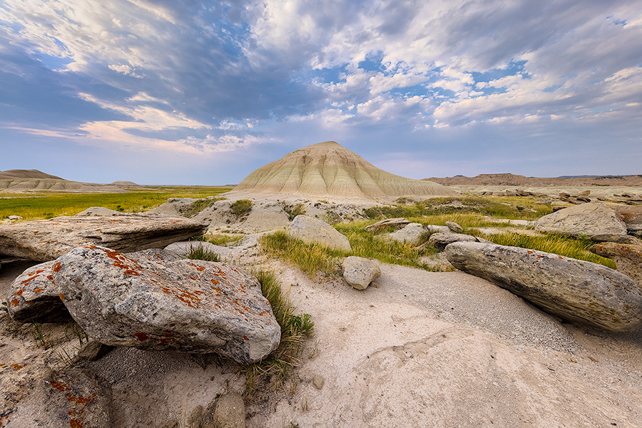 A scenic landscape photograph of Toadstool Geologic Park in western Nebraska in the late afternoon. - Nebraska Photography