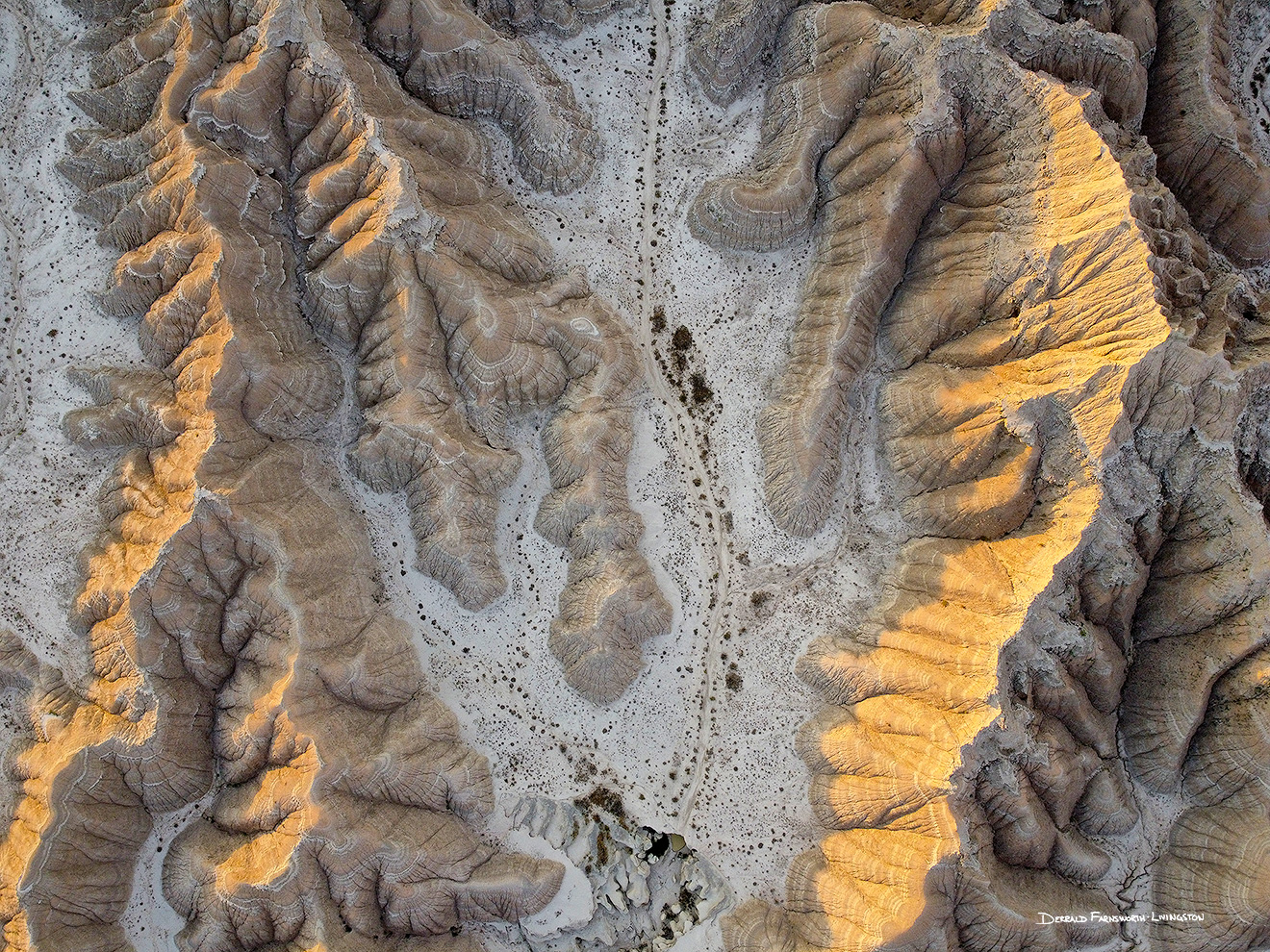 An abstract drone landscape photograph of the badlands Toadstool Geologic Park in western Nebraska. - Nebraska Picture