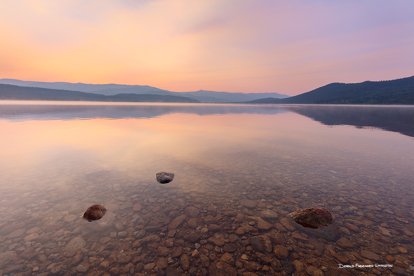 A scenic landscape photograph of a sunrise on Twin Lakes near Leadville, Colorado. - Colorado Picture