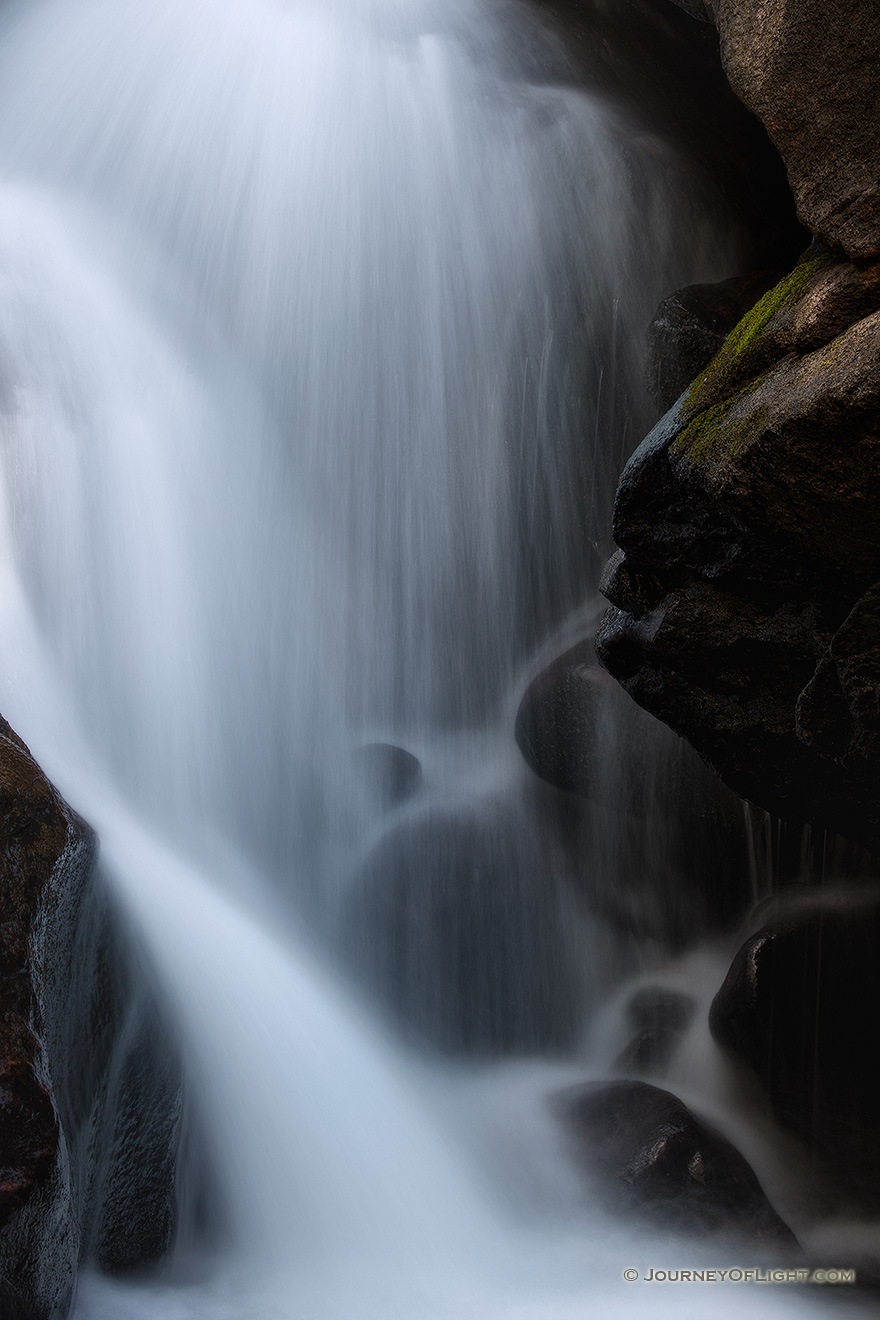 Water flows over the rocks at Cascade Falls on the North Inlet Stream in Rocky Mountain National Park, Colorado. - Colorado Picture