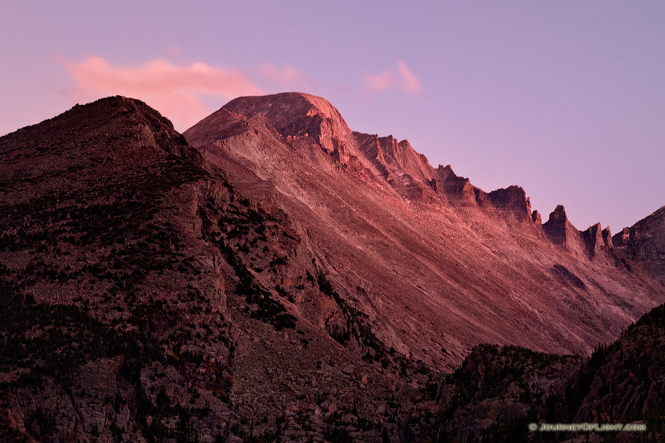 The last light of sunset emblazens Long's Peak with a crimson hue before dimming into night. - Rocky Mountain NP Picture