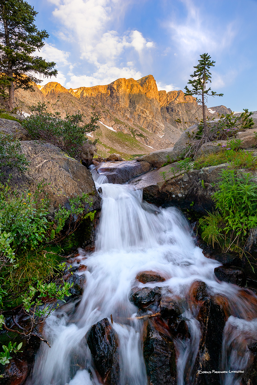 A scenic landscape photograph of a waterfall below Mirror Lake in the Rocky Mountain National Park, Colorado. - Rocky Mountain NP Picture
