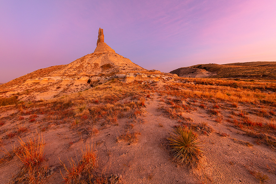 A scenic landscape Nebraska photograph of a sunset and Chimney Rock in western Nebraska. - Nebraska Photography