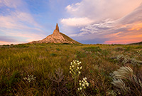 A scenic landscape photograph of the sunset and Chimney Rock National Historic Site. - Nebraska Photography