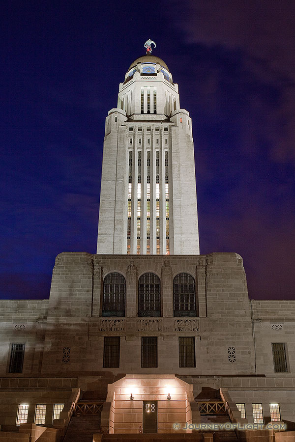The Nebraska state capitol building in Lincoln at sunset on a cool spring evening.  This building houses the only state unicameral type government in the United States. - Lincoln Photography