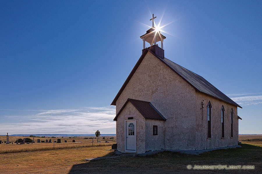 The 1887 Immaculate Conception Catholic Church and Cemetery are all that remain of the Montrose, Nebraska on the wind-swept prairie of the Oglala National Grassland. - Nebraska Photography