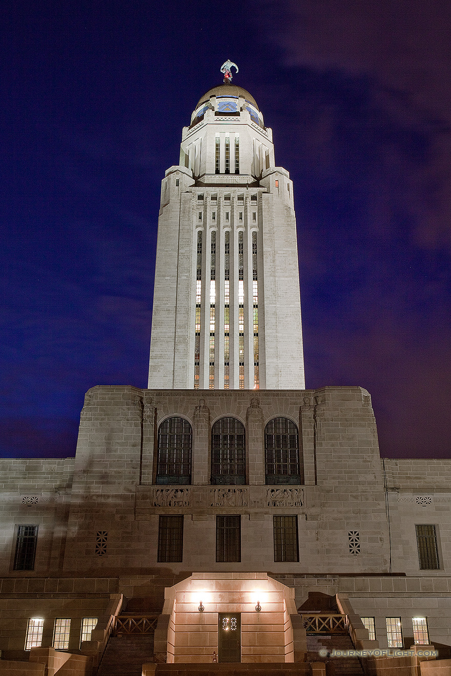 The Nebraska state capitol building in Lincoln at sunset on a cool spring evening.  This building houses the only state unicameral type government in the United States. - Lincoln Picture