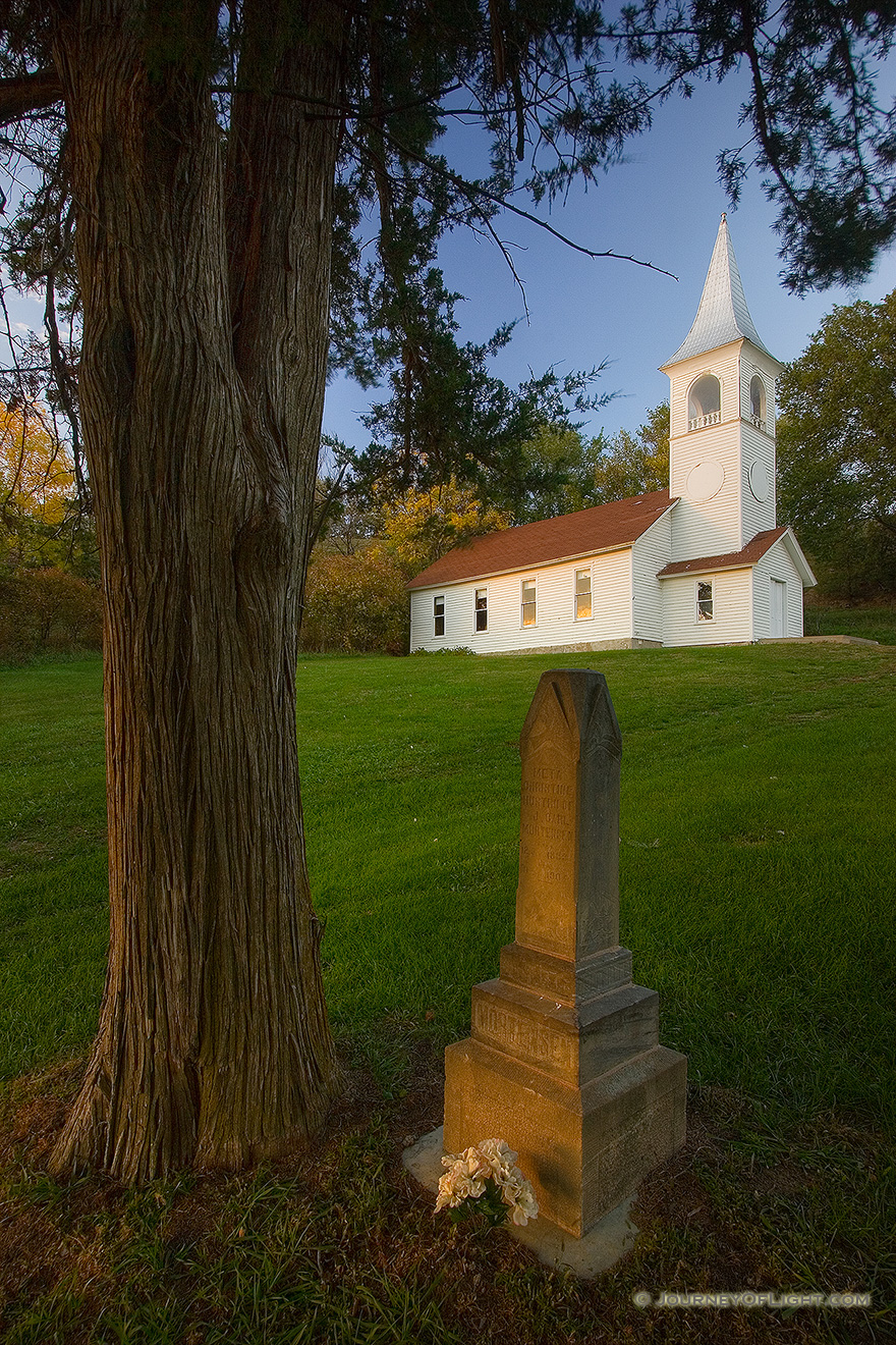 The Ingemann Danish Church and Cemetery west of Moorhead in the Loess Hills of Iowa was founded by early immigrants in 1884. This unique country church offers a scenic respite for travelers. - Iowa Picture