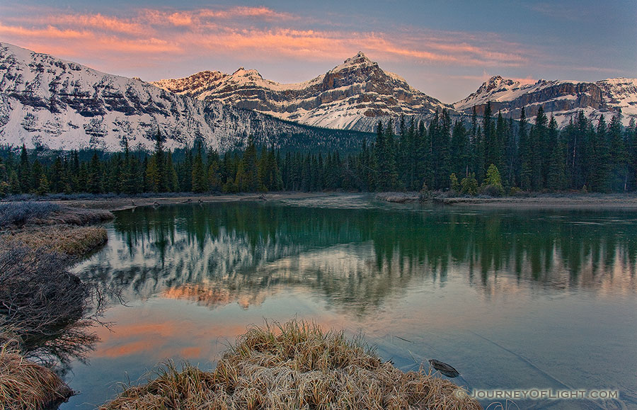 The morning sun hits the Mt. Lauriet near an Oxbow of the Mistaya River in Banff National Park. - Banff Photography